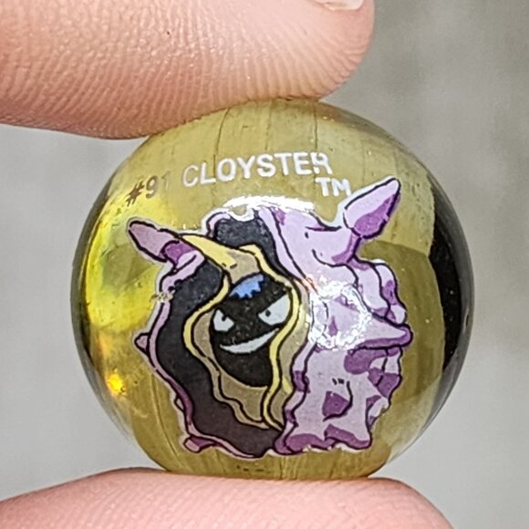 Vintage Pokemon #91 Cloyster Marble Clear Yellow Glass Toy Biz Collectible - Picture 2 of 4